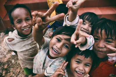 Happy children smiling at a community education centre